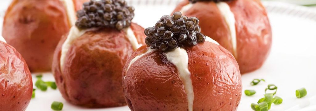 Roasted red potatoes filled with creme fraiche and topped with Imperial Oscietra